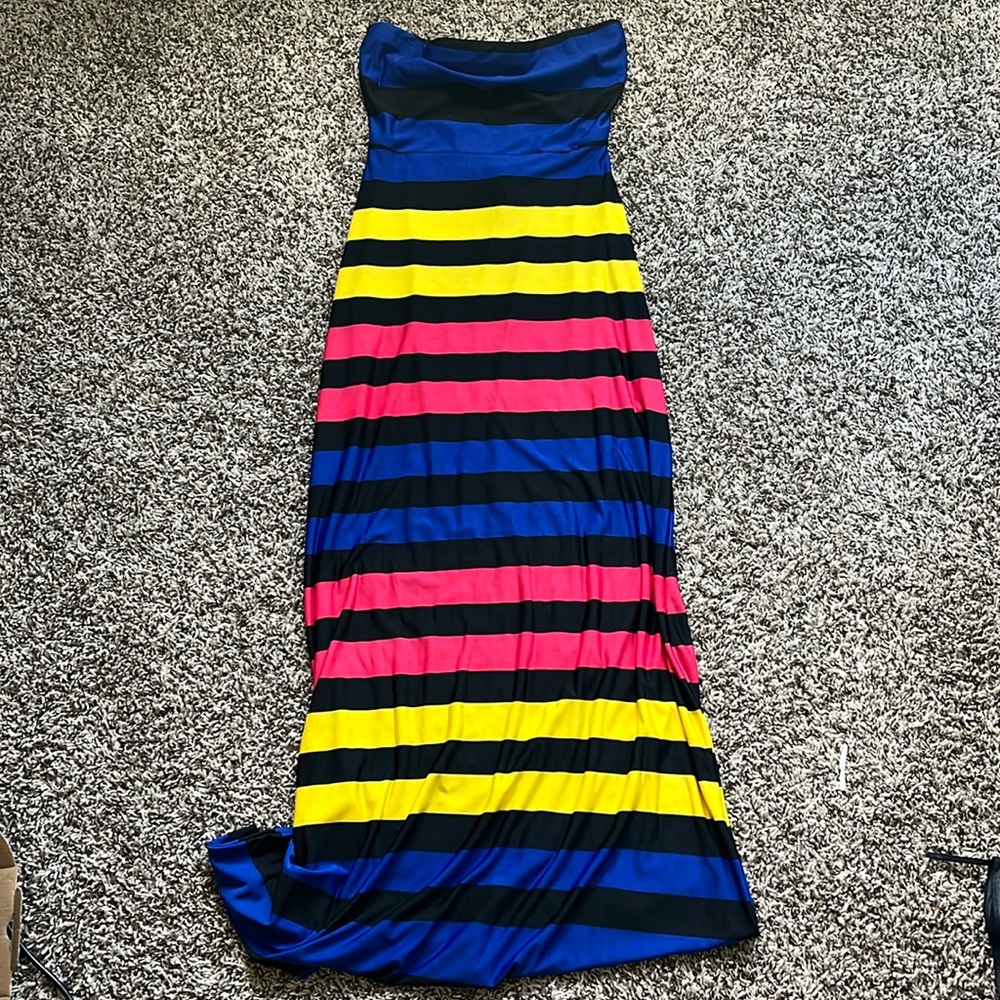 Strapless striped dress with cute back cut out.  Fitted and very flattering